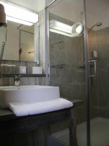 Hotel room bathroom with shower